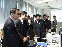 Prof. Xu Yangsheng (1st from left), Associate-Pro-Vice-Chancellor introduces Prof. Zhang Yulin (2nd from left) , President of National University of Defense Technology to the Advanced Robotics Laboratory